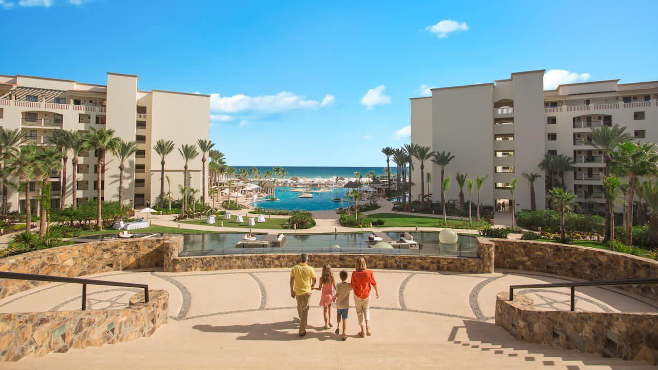 Hyatt-Ziva-Los-Cabos-P188-Family-Walking-Down-Main-Steps.16x9