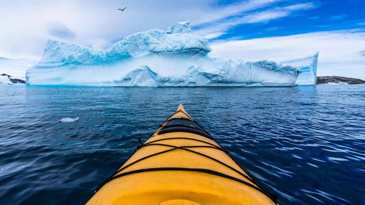 https://travelforless.us/wp-content/uploads/2023/08/Iceberg-Kayak-1280x720.jpg