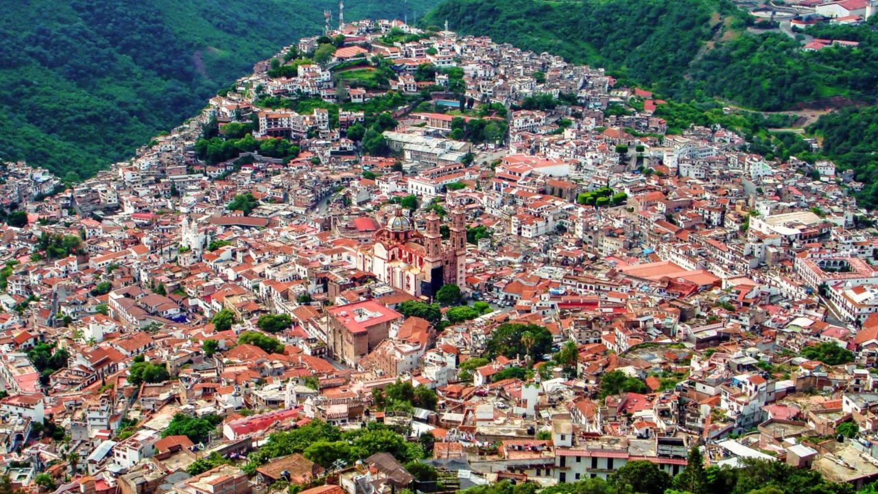 https://travelforless.us/wp-content/uploads/2023/08/view-Taxco-Mexico-1280x720.jpg